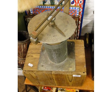 A pine cased gimballed ships compass.