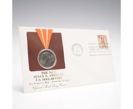 A 1979-S Susan B. Anthony Dollar Coin paired with an Americana Series One Dollar postage stamp, both housed within a First Da