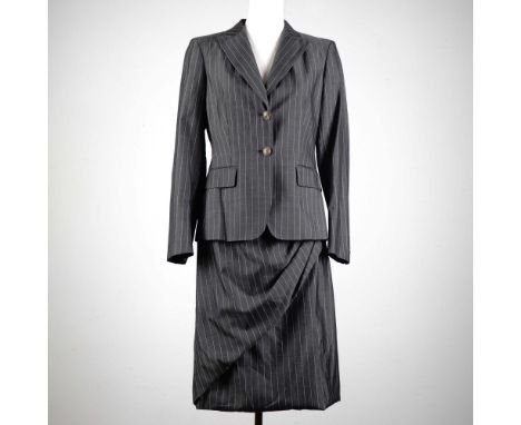 Exude timeless sophistication with this vintage Max Mara 2-piece pinstripe suit, crafted in Italy from a premium wool blend w