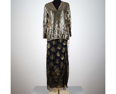 This vintage ensemble by iconic British designer Bill Gibb captures the spirit of 1980s glamour with a refined touch of theat