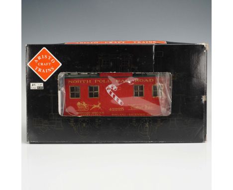 Celebrate the holiday spirit on the rails with this festive Aristo-Craft Christmas Bobber Caboose, model ART-42225, crafted i