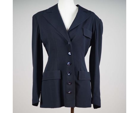 This sharp and refined Valentino Boutique vintage  jacket is a masterclass in classic Italian tailoring. Made in Italy and ma