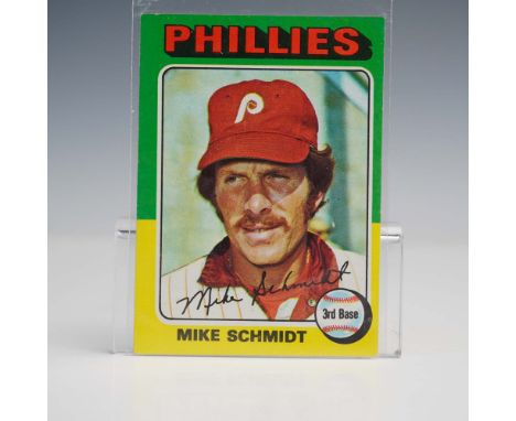 This vintage 1975 Topps baseball card features Mike Schmidt, the legendary third baseman for the Philadelphia Phillies. Showc