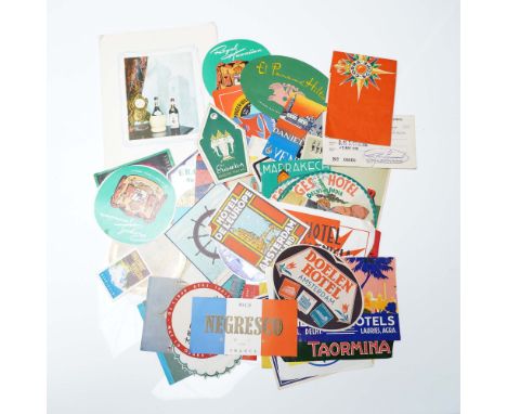 An eclectic and vibrant assortment of over 50 pieces of vintage hotel and travel ephemera, featuring approximately 47 unique 