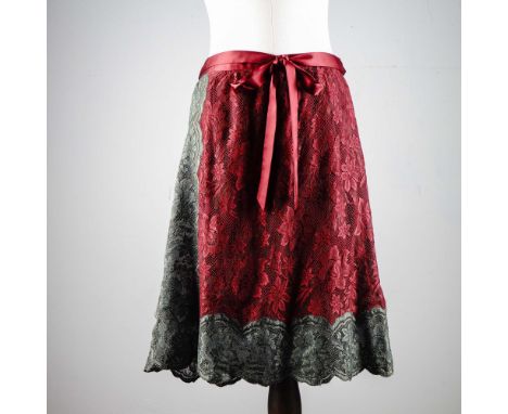 Elegant Valentino Boutique skirt featuring a rich bordeaux and forest green floral lace overlay with a scalloped hem, lined f