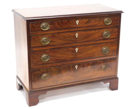 A 19thC mahogany chest of drawers, with a moulded edge, above four graduated drawers each with ivory escutcheons and brass ha