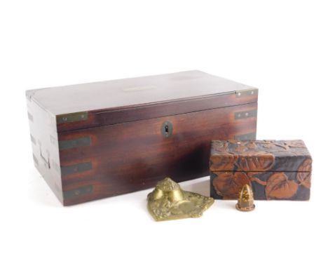 A mahogany and brass bound box, with side handles, a brass inkwell and a carved wooden oriental box.