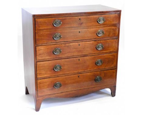 An early 19thC mahogany and boxwood strung secretaire chest, the rectangular top with a crossbanded border above a fall front