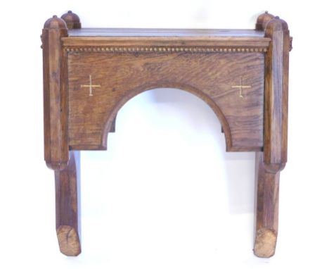An ecclesiastical oak bracket, with faceted end supports, adapted, 49cm wide.