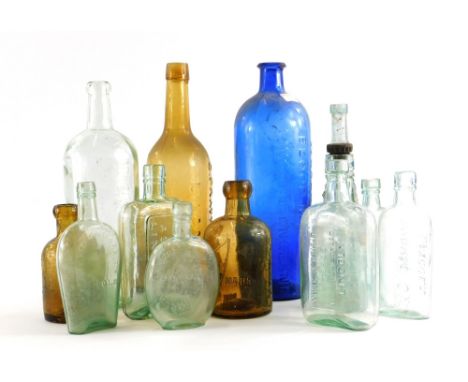 A collection of Lincoln related bottles, to include Clark's World Famous Blood Mixture, another wine bottle stamped C.Pratt a