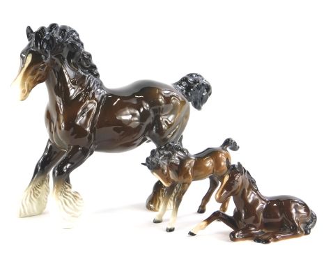 A Beswick ceramic figure of a horse, and two Beswick Foals, (3).