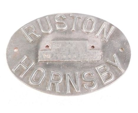 A Ruston Hornsby oval aluminium engine plaque, 16.5cm x 11cm.