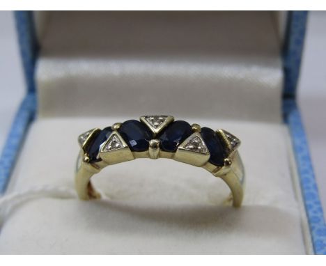 9ct YELLOW GOLD SAPPHIRE &amp; DIAMOND RING, 4 geometrically set cushion cut sapphires, each separated by an accent brilliant