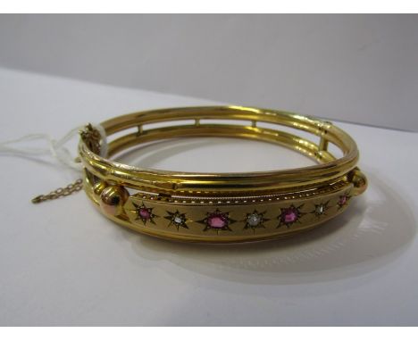 VINTAGE 9ct YELLOW GOLD HINGED RUBY &amp; DIAMOND SET BANGLE, in fitted case, approx 14 grams 