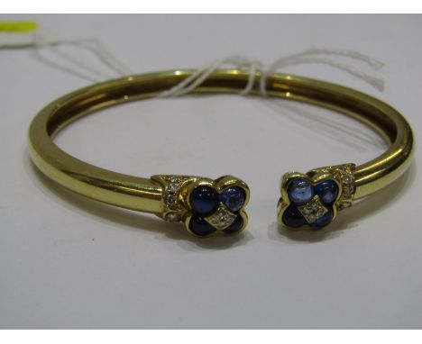 SAPPHIRE &amp; DIAMOND SPRUNG BANGLE, unusual design 8 well matched cabochon cut sapphires in 2 groups of 4 set with accent b