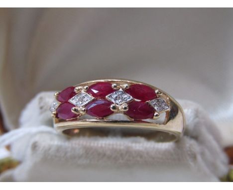 9ct YELLOW GOLD RUBY &amp; DIAMOND ETERNITY STYLE RING, 6 marquise cut rubies set in pairs, each seperated by a small accent 