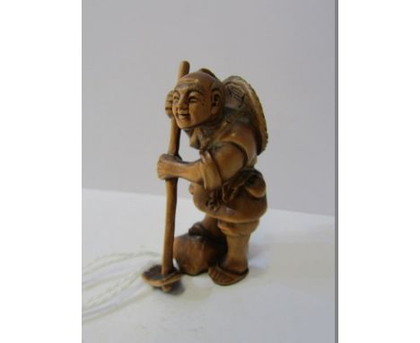JAPANESE NETSUKE, signed carved fruitwood netsuke of Peasant Farmer 