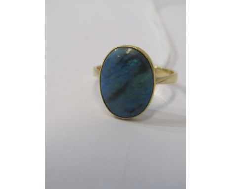 18ct YELLOW GOLD OVAL CUT BLACK OPAL RING, size K/L 