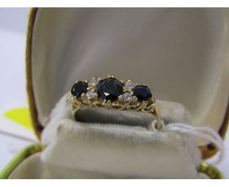 9ct YELLOW GOLD SAPPHIRE CLUSTER RING, 3 graduated sapphires each seperated by a pair of white stones in 9ct yellow gold, siz