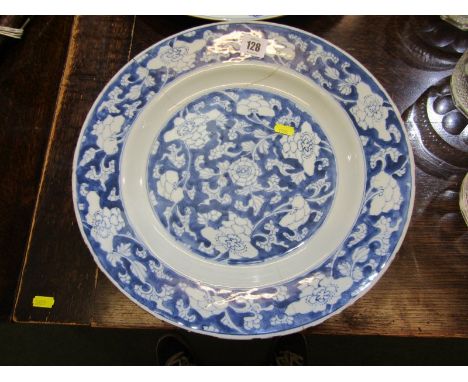 18th CENTURY CHINESE CHARGER, with floral and foliate underglaze blue decoration (damaged and repaired), 14" dia with seal ma
