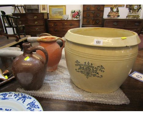DOULTON LAMBETH, Doulton Lambeth earthenware bread pan, 15" diameter, also am earthenware pitcher and a glazed flagon 