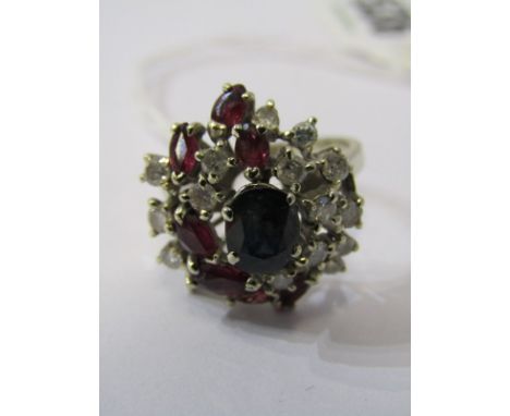 18ct WHITE GOLD RUBY, SAPPHIRE &amp; DIAMOND CLUSTER RING, principal oval cut sapphire surrounded by mixed marquise cut rubie