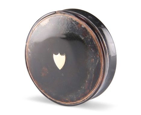 A 19TH CENTURY TORTOISESHELL SNUFF BOX A 19TH CENTURY TORTOISESHELL SNUFF BOX, circular form, the lid inlaid with a central v