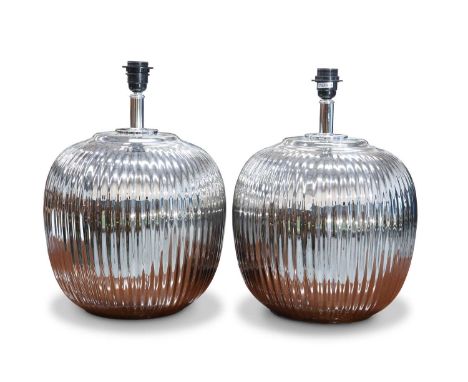 A PAIR OF CONTEMPORARY CHROME EFFECT LAMP BASES A PAIR OF CONTEMPORARY CHROME EFFECT LAMP BASES, of reeded globular form. (2)