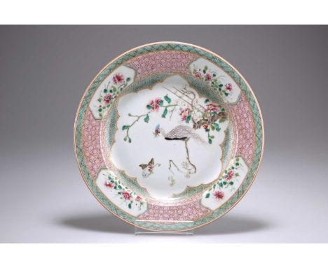 A CHINESE EXPORT FAMILLE ROSE PLATE, 18TH CENTURY A CHINESE EXPORT FAMILLE ROSE PLATE, 18TH CENTURY, circular, enamel painted