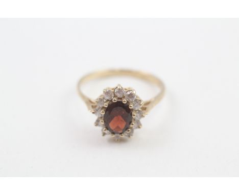 9ct gold garnet and cubic zirconia halo dress ring (2.6g) 