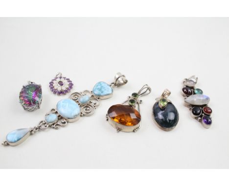 Six assorted silver gemstone pendants including Larrimar and opal (87g) 