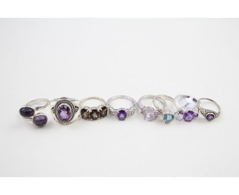 A collection of silver stone set rings including amethyst and topaz (30g) 