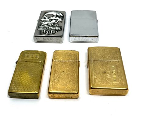 5 Zippo lighters 