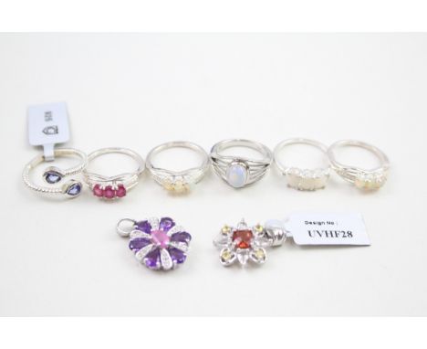 A collection of stone set silver jewellery including opal and ruby (24g) 