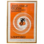 A framed reproduction one sheet poster for Alfred Hitchcock's Vertigo Framed size approximately: