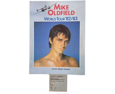A Mike Oldfield tour programme, from the 1982/3 World Tous, together with original concert ticket stub