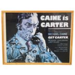 A framed reproduction quad poster for Get Carter, starring Micahel Caine and Britt Ekland Framed