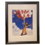 A framed and glazed colour photograph bearing the signature of Jennifer Aniston (unauthenticated