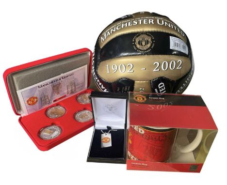 A mixed lot of Manchester United Football Club memorabilia, to include:  - Commemorative football, 1902-2002 centenary - MUFC