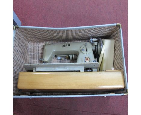C.Scope Metal Detector, Alfa sewing machine. (2).Lot 1500 - The Model is IB/TR
