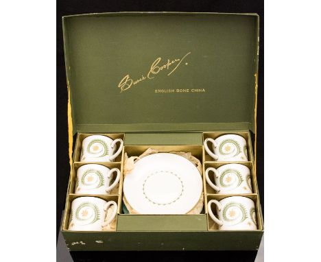 A boxed 1950s Susie Cooper set of six coffee cups and saucers, Assyrian motif pattern 