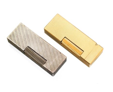 Two Alfred Dunhill Rollagas lighters, concealed hinge, silver plated engine turned vertical wave design and a barley turned g