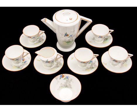 Eric Slater for Shelley, an Art Deco Eve coffee set, stylised flower and butterfly design, orange trim, including five cups, 