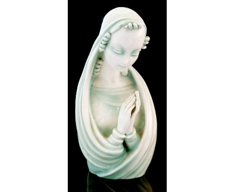 Rudolph Knorlein for Goldscheider, an Art Deco Austrian figure of the Madonna, circa 1930, pale green glaze, incised signatur