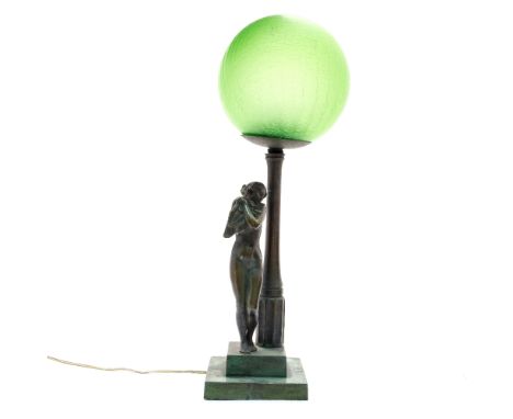 A 1930s Art Deco figural table lamp with spherical green crackle glass shade 