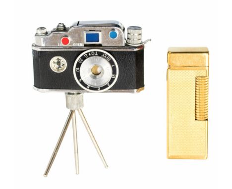 A novelty Japanese photo-lite camera table lighter, on tripod stand and an Alfred Dunhill Rollagas lighter, circa 1960, gold 