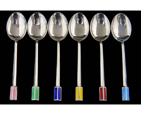 A harlequin set of six Art Deco silver and enamel teaspoons, tapered and faceted handles with engine guilloche enamelled term