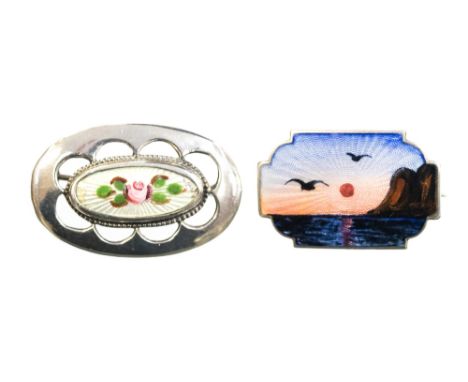 Ivar Holth, a Norwegian enamelled silver brooch, the engine turned ground decorated with a coastal dawn or sunset scene with 