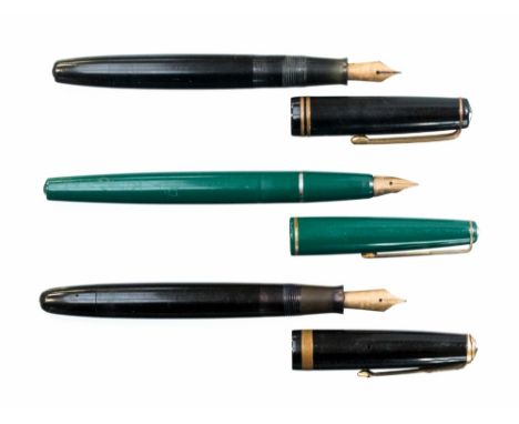 Parker fountain pens including two Duofold, circa 1940s and 1950s models, with 14 carat gold nibs, black resign with button f