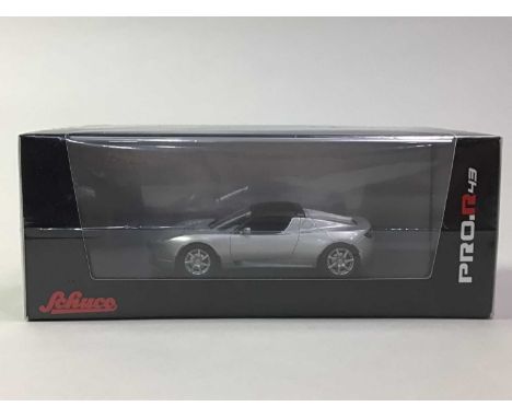 SCHUCO EIGHT PRO.R43 SCALE MODELS comprising VW Kafer, Chevrolet Blazer 'Amity Police Dept.' (x5) and Tesla Roadster (x2), bo